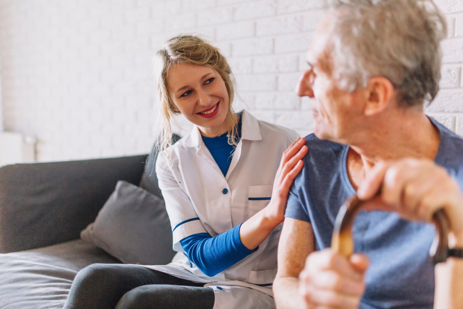 Home care carer supporting a client at Infinity Comfort Care in Middleton and Manchester